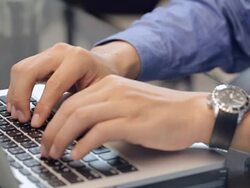 Businessman hands busy using laptop at office desk. Stock Footage