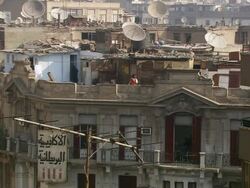 WS View of women entering in room on rooftop of apartment building, interior view of family life in small apartment / Cairo, Egypt Stock Footage