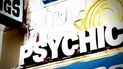 Signs advertise tarot readings and a psychic. Stock Footage