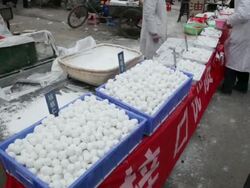 MS TU Glutinous rice balls for Lantern Festival selling in street market / xi'an, shaanxi, china Stock Footage