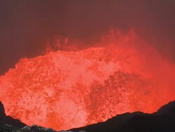 Medium shot of the lava lake at Marum volcano at dusk, Marum Volcano, Ambrym Island, Vanuatu Stock Footage