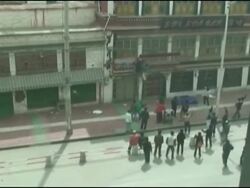 WRAP AmVid shot by tourist of Mar 14 rioting in Lhasa; tourist intvw News Clip