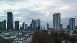 A winter day to night time lapse of the central Frankfurt am Main skyline (Germany) with fast moving, heavy cloud cover overhead Stock Footage