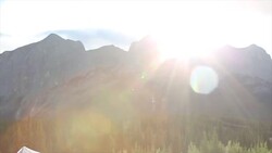 Bearded man in medieval/viking costume pauses by river Stock Footage