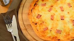 Hawaiian pizza served on a wooden tray Photo Brown. Stock Footage