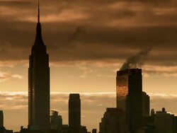 Time lapse of steam rising off a skyscraper adjacent to the new yorker building and the empire state building in the new york city skyline at sunrise with clouds moving in the sky Stock Footage