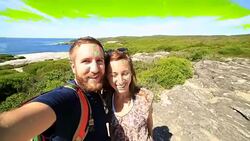 Cheerful young couple takes a selfie portrait by the sea Stock Footage