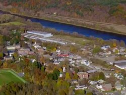 MS AERIAL View of overflow dam at Windsor town / New Hampshire, United States Stock Footage