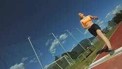 HD Super Slow-Mo: Woman Taking Off For A Long Jump Stock Footage