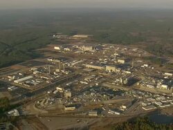 MS AERIAL Shot of Savannah River Nuclear sites (four inactive) with wooded area / South Carolina, United States Stock Footage