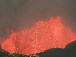 Lava explodes onto crater wall, Marum Volcano, Ambrym Island, Vanuatu Stock Footage