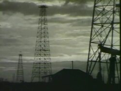 Oil rig and power lines Stock Footage