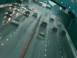 Time lapse, overhead traffic crosses Ben Franklin Bridge during rain storm. Stock Footage