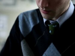 CU PAN TU Businessman sitting at office conference table writing on notepad/Seattle, Washington, USA Stock Footage