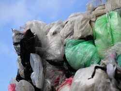 Pile of Plastic Waste Against Blue Sky PAN Stock Footage