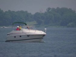 MS TS Boay passing through lake / Minneapolis, Minnesota, United States  Stock Footage