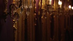 Light bulbs shine in light fixtures decorated with crystals. Stock Footage