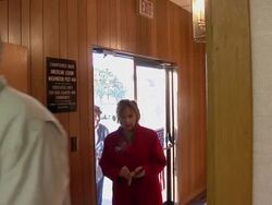 CU, ZO, MS, People entering  into polling place through door with american flag on it, New Knoxville, Ohio, USA Stock Footage