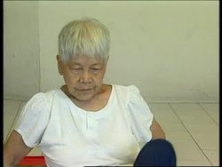 SINGAPORE: WOMAN ATTRIBUTES HER LONGEVITY TO BENEFITS OF YOGA News Clip