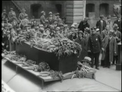 Parade participants escort a vegetable covered coffin during the Great Depression.\n News Clip