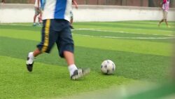 Man fakes out opponent in local soccer match Stock Footage