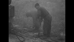 US soldiers place anti-tank mines on the Western Front during World War II News Clip