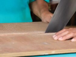 Two man cutting board. Stock Footage