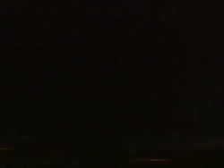 Lightning branches across clouds and then forked lightning strikes from cloud to ground twice. Branched and forked lightning. Stock Footage