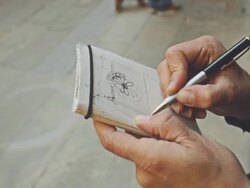 Woman writing on sketchbook architectural details Stock Footage