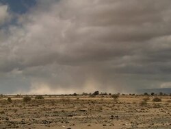 MS View of storm of sand and cloudy shadow moving / Djibouti Stock Footage