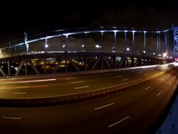 Night time, time lapse, wide angle of Philadelphia cityscape, overhead shot traffic crosses the Ben Franklin Bridge. Stock Footage