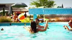 People having fun at swimming pool. Stock Footage
