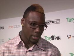 INTERVIEW -  Jason Pierre-Paul talks about giving back, admits he's not that great at table tennis, and that a lot of kids look up to him and its a good thing at TopSpin NYC 2013 Charity Event at the Metropolitan Pavilion Stock Footage