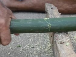 Hand auger drilling bamboo. Stock Footage