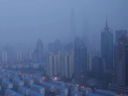 Shanghai Downtown Timelapse - Night to Day on a fairly clear day. Stock Footage