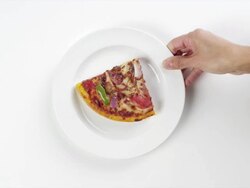 CU Woman hand entering setting down round white plate with slice of cheese, pepperoni, mushroom, onion and green pepper / Omaha, Nebraska, United States Stock Footage