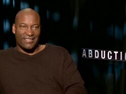 INTERVIEW: John Singleton on his thoughts of the comparisons being made between Taylor and Hollywood's older action stars. (Footage by WireImage Video/Getty Images Entertainment Video) Stock Footage