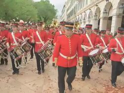 MS Red band playing at town square Esplanade on easter parade AUDIO / Kerkyra, Corfu, Greece Stock Footage