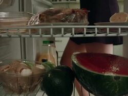 Woman puts eggs into the fridge Stock Footage