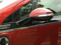 CU PAN ZI Connector being removed from charging port and connected to charging socket of electric car / Rochester, Michigan, United States Stock Footage