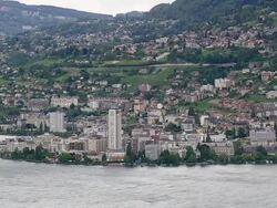 WS AERIAL Shot of town Montreux at coast / Vaud, Switzerland Stock Footage