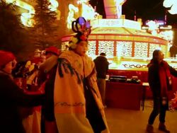 MS TS Actors carry children dressed as ancient figures during shehuo performances at city wall new year lantern festival, Shehuo is traditional festive folk celebration during chinese spring festival AUDIO / xi'an, shaanxi, china Stock Footage