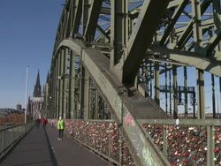 MS Shot of Rhine river Cathedra, Hohenzollern Bridge and love Padlocksl / Cologne, North Westphalia, Germany Stock Footage