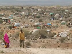 WS View of entrance of refugee camp in Djibouti with tents made of scrap plastic sheets / Djibouti refugee camp, Djibouti Stock Footage