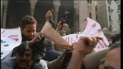 WRAP +4:3 Mass protests; Egypt puts Nobel laureate under house arrest Instructional Video