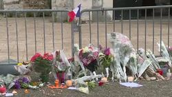 CLEAN : Mourners lay flowers for slain French priest News Clip