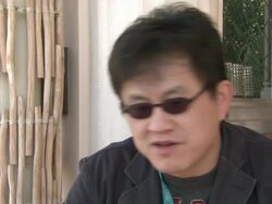 INTERVIEW: Chao-Bin Su on working with John Woo and his influence at the Reign of Assassins Interview: 7th Dubai International Film Festival at Dubai .  Stock Footage