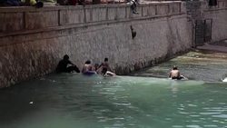 Children swimming in an Aleppo aqueduct News Clip
