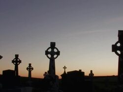 Celtic crosses in graveyard at dawn Stock Footage