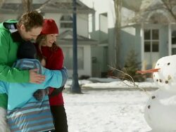 Family looks at what they have built Stock Footage